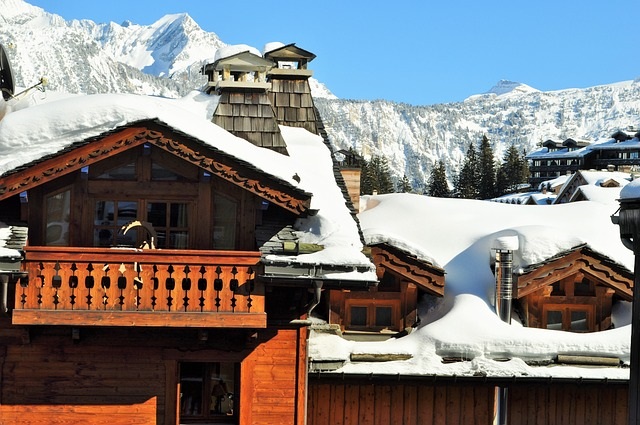 investir aux menuires-chalet de montagne enneigé